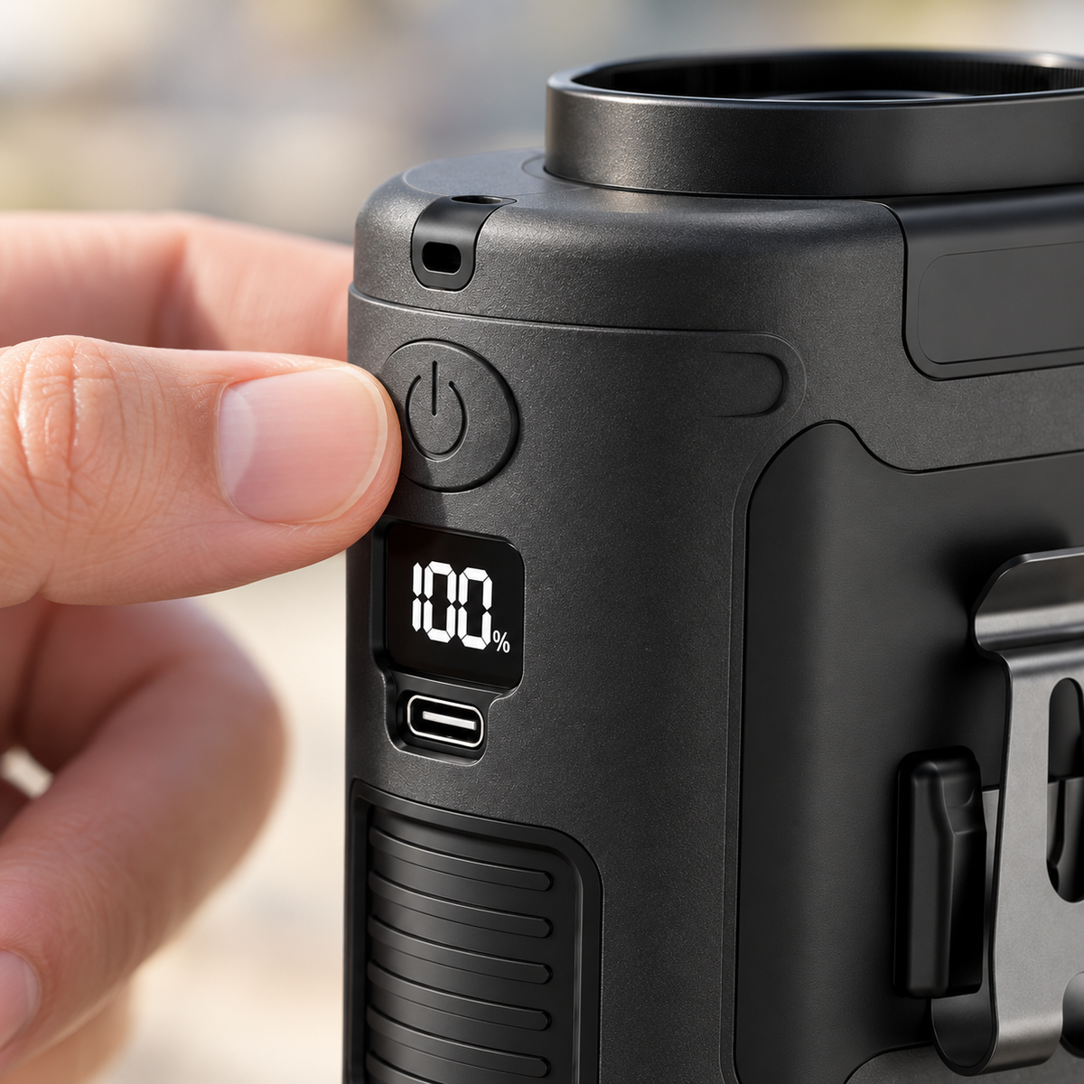 Close-up of the waist fan power button and battery display
